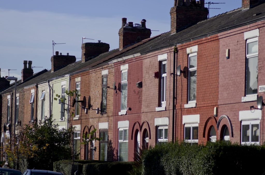 Brick terraced homes that have been retrofitted.